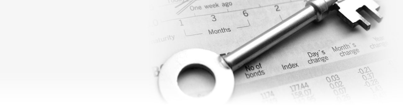 Banner picture of a key atop a balance sheet